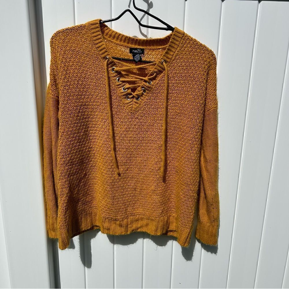 Rue21 long sleeve pull over sweater with lace up neckline size Xanax